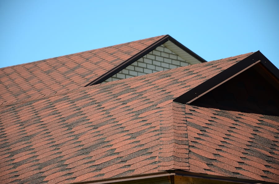 Close-up view of durable architectural asphalt shingles on a home